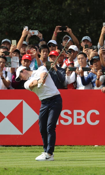 McIlroy wins HSBC Champions in a playoff over Schauffele